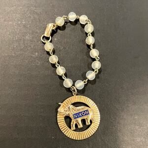 Vintage collectible President Nixon elephant bracelet beaded stamped Warner